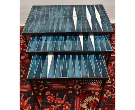A mid century retro tile top nest of three tables, largest width 54cm.&nbsp;