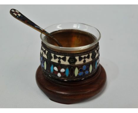An Imperial Russian silver gilt and cloisonne enamel salt cellar, associated clear glass liner. 