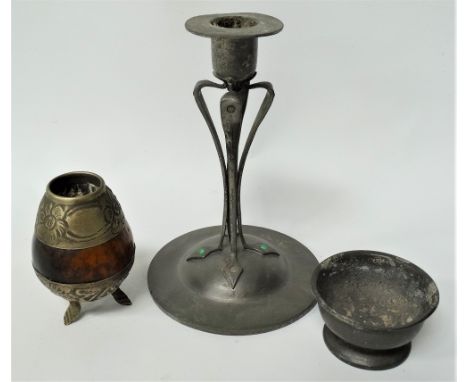 A continental pewter Secessionist style candlestick, possibly by Walter Scherf &amp; Co. with applied green glass cabochons (