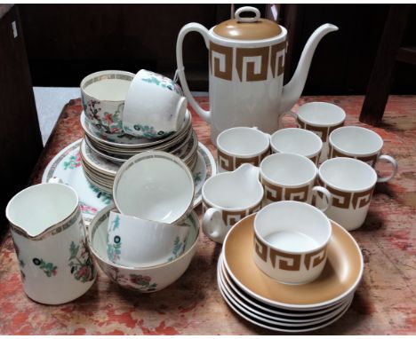 A Susie Cooper coffee set in 'Keystone' pattern, Old Gold C2134, comprising a coffee pot, milk jug, sugar bowl and six coffee