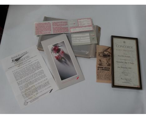 A collection of Concorde related ephemera, including flight certificate ticket and two menus. 