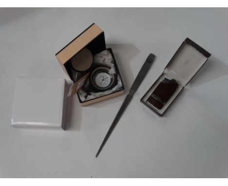 A Concorde letter opener, together with Concorde lighter and Links Concorde clock. 