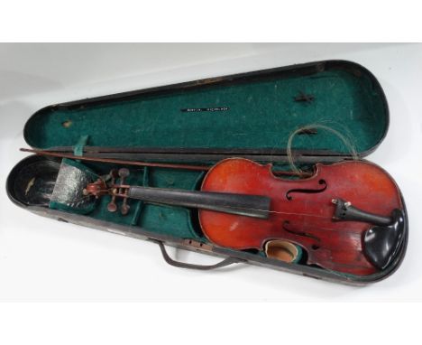 A Stradivarius copy violin with 13.25inch back, the button stamped J.T.L, with nickel mounted bow and within hardwood case. 