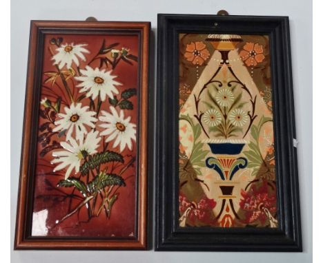 Two Victorian pottery rectangular tiles, one with stylised vase issuing flowers, the back signed FLAXMAN, 29 x 14cm, together