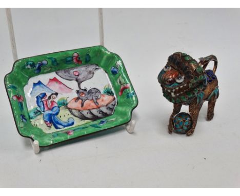 A Chinese white metal and coloured enamel Buddhistic lion with ball, width 7cm, together with a Chinese enamel on copper rect