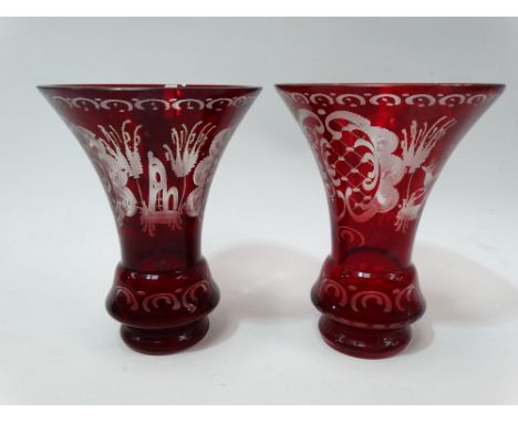 A pair of 19th century bohemian glass ruby overlay wheel engraved vases, height 15cm. 