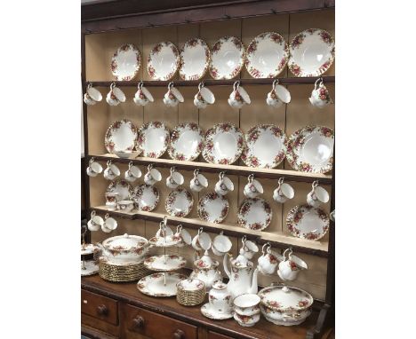 A large quantity of Royal Albert 'Old Country Roses' table wares for twelve, including dinner, dessert, soup plates, tea cups