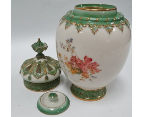 An early 20th century Royal Worcester ivory ground pot pourri vase, lid and cover, shape No.2048, painted and gilded with flo