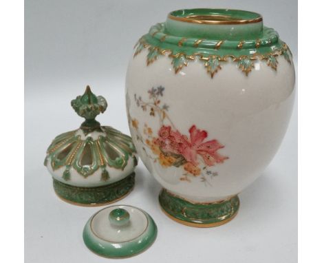 An early 20th century Royal Worcester ivory ground pot pourri vase, lid and cover, shape No.2048, painted and gilded with flo