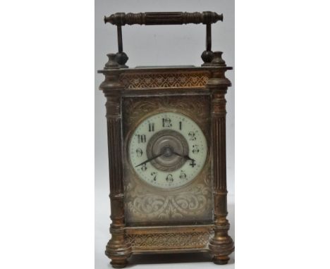 A 19th century brass carriage timepiece in architectural case, the 1.75 inch enamel chapter ring with Arabic numerals and wit