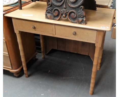 A 19th century pine side table with bamboo style turned legs, fitted two drawers, width 92cm. 