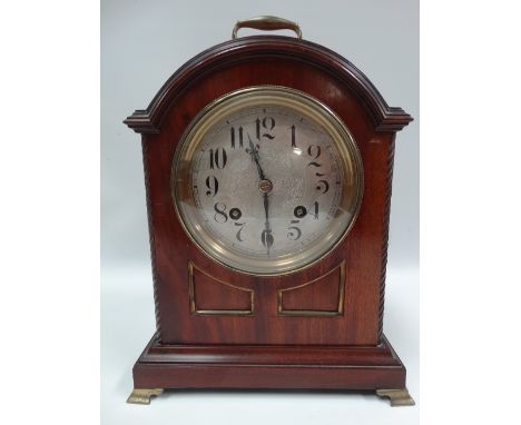 An Edwardian mahogany cased bracket clock with eight day brass movement, signed M.B.P striking on a gong.
