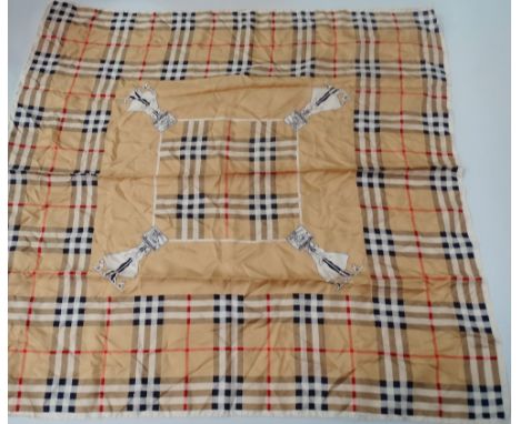 A Burberry silk scarf. 