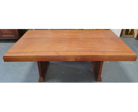 A large rosewood Art Deco style dining table on twin supports, length 186cm.