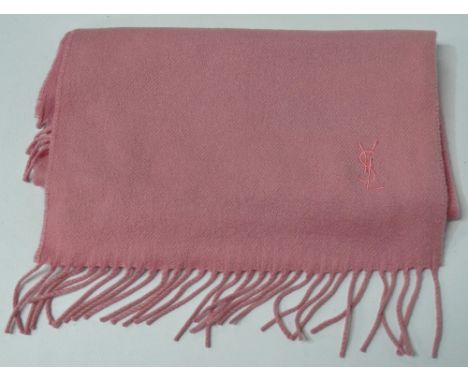 A Yves Saint Laurent pink cashmere scarf. 