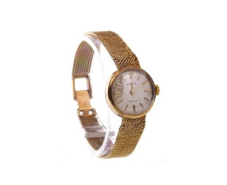 LADY'S ROLEX NINE CARAT GOLD MANUAL WIND WRIST WATCH, the round buff dial with applied gold coloured baton hour markers, 20mm