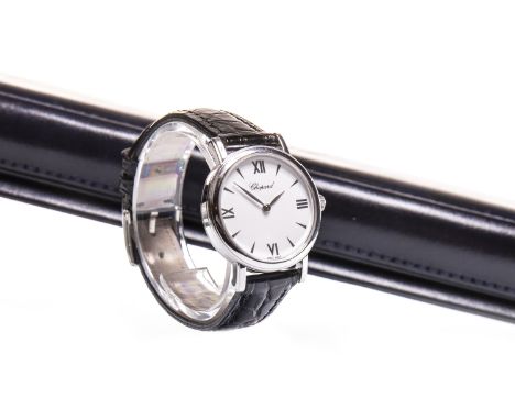 LADY'S CHOPARD EIGHTEEN CARAT WHITE GOLD QUARTZ WRIST WATCH, the round white dial with applied Roman numerals and tapered hou