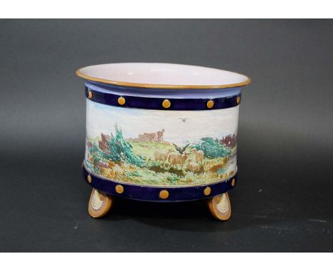 MINTON MAJOLICA JARDINIERE - EDOUARD RISCHGITZ a Minton majolica jardiniere, the central band painted with animals in a lands