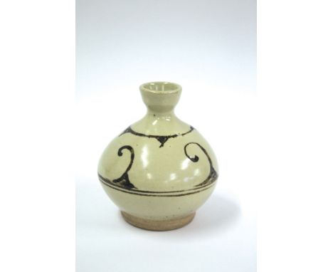 BERNARD LEACH STUDIO POTTERY VASE a small pottery vase with a celadon style glaze and black painted design. Impressed seal ma