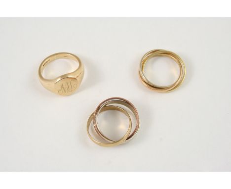 A 9CT. GOLD SIGNET RING engraved with initials, 6.7 grams, size J 1/2, together with an 18ct. three colour gold triple band r