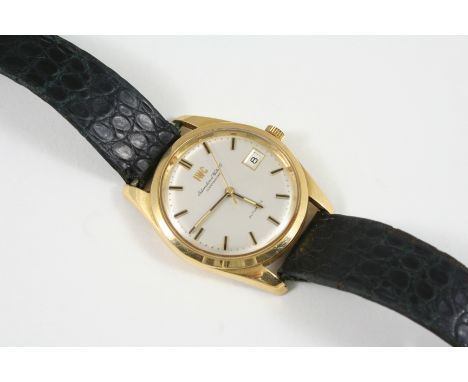 A GENTLEMAN'S 18CT. GOLD AUTOMATIC WRISTWATCH BY IWC the signed circular dial with baton numerals and date aperture, with pre