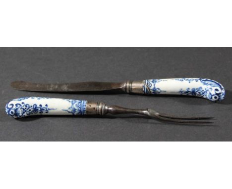 BOW PISTOL GRIP KNIFE AND FORK, circa 1770, blue painted with scrolls and foliage, white metal collars, steel blade and two p