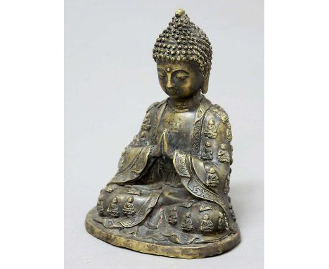 BRONZE BUDDHA, seated with hands together, a swastika on the chest, wearing a 1000 buddha robe, height 22cm