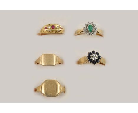 THREE GEM SET AND GOLD RINGS including a sapphire and diamond cluster ring, set in 9ct. gold, size L 1/2, an emerald and diam