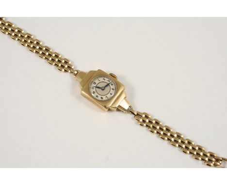 A LADY'S 9CT. GOLD WRISTWATCH the circular dial with Arabic numerals, on a gold bracelet with ladder clasp, 17.5cm. long, 13 