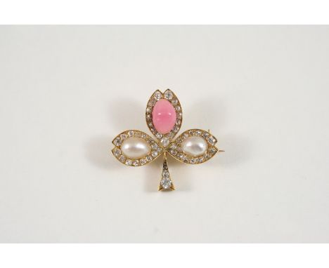 AN EARLY 20TH CENTURY DIAMOND AND PEARL BROOCH the trefoil leaf design is set with a pink conch pearl and two untested pearls