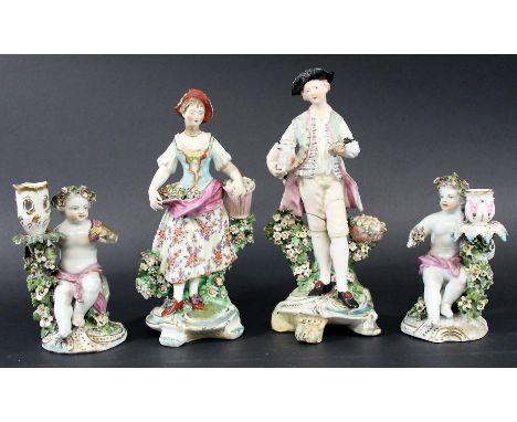 PAIR OF DERBY PATCH MARK GARDENER FIGURES, late 18th century, he holding a lamb, she a basket of eggs, height 26cm; together 