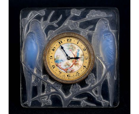 LALIQUE TIMEPIECE - INSEPERABLES an opalescent and clear glass clock in the Inseperables design, the Swiss movement painted i