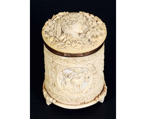 SRI LANKAN OR ANGLO-INDIAN IVORY CYLINDRICAL BOX AND COVER, circa 1800, carved with a profile portrait of Cyris to the top an