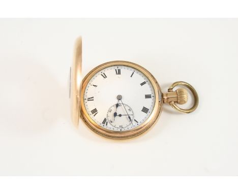 A GOLD PLATED HALF HUNTING CASED POCKET WATCH the white enamel dial with Roman numerals and subsidiary seconds dial, the move