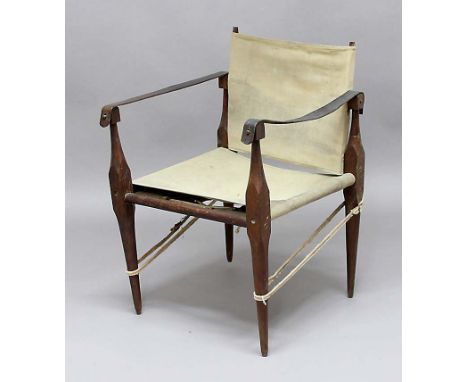 A SAFARI CHAIR - KAARE KLINT a vintage Safari Chair designed by Kaare Klint, the wooden framed chair with canvas seat and bac