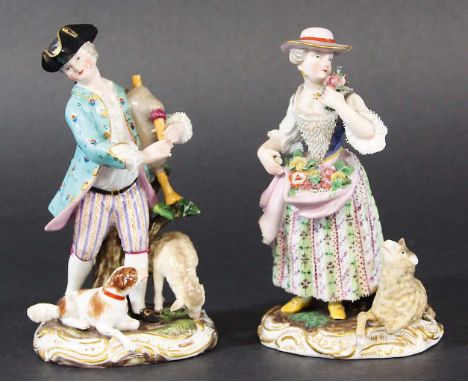 PAIR OF MEISSEN FIGURES, 19th century, he playing bagpipes she with her skirt full of flowers, blue crossed swords marks, inc
