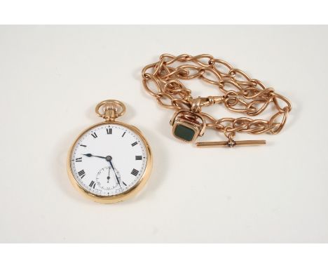 A 9CT. GOLD OPEN FACED POCKET WATCH the white enamel dial with Roman numerals and subsidiary seconds dial, metal inner case, 