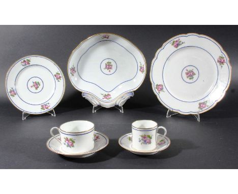 FRENCH PORCELAIN PART SERVICE, late 19th century, painted with rose sprigs inside gilt and blue bands, comprising forty plate