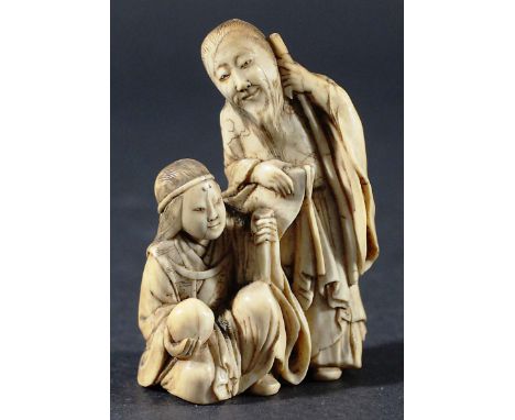 JAPANESE IVORY NETSUKE, of Shoulau and Guanyin, signature to base, height 6.5cm