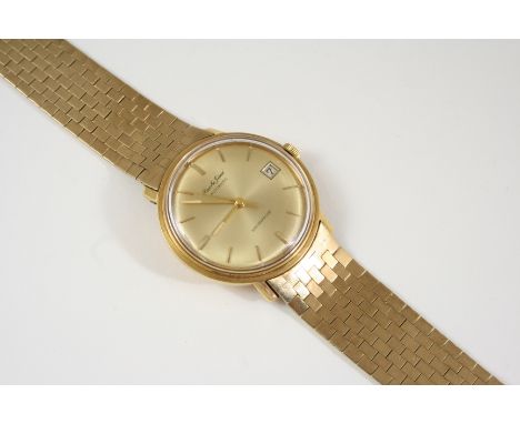 A GENTLEMAN'S 18CT. GOLD AUTOMATIC WRISTWATCH BY BEUCHE-GIROD the signed circular dial with baton numerals, date aperture and