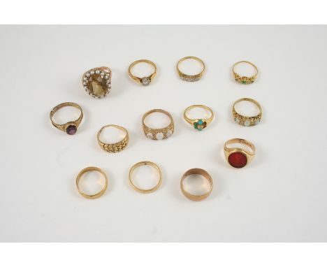 THIRTEEN ASSORTED GOLD AND GEM SET RINGS including a moonstone and diamond ring, set in 9ct. gold, size N, a 9ct. gold band s