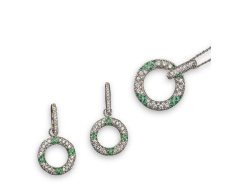 An emerald and diamond suite of jewellery, the circular-shaped pendant pavé-set with circular-cut diamonds and quartered with