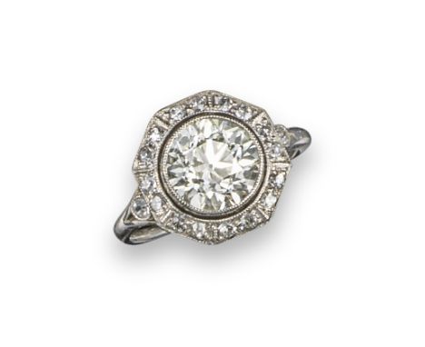 An Art Deco diamond cluster ring, the octagonal-shaped cluster centred with an old circular-cut diamond weighing approximatel