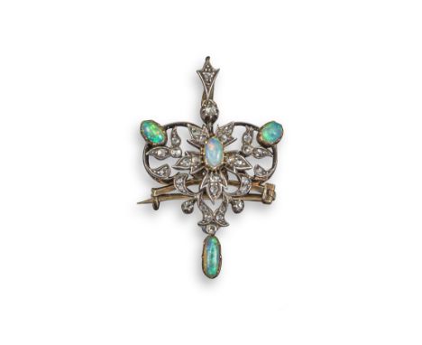 A Victorian opal and diamond pendant, set with oval opal cabochons within diamond-set foliate surround in silver and gold, de