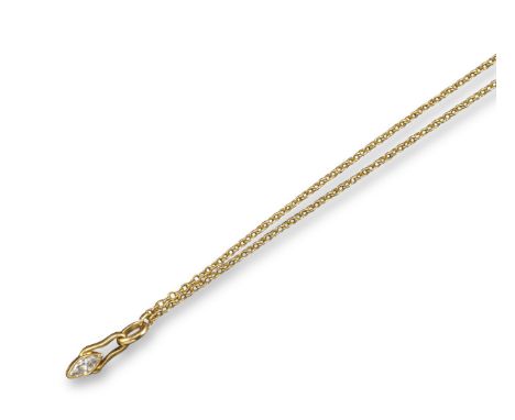 A diamond-set gold pendant by Cartier, the marquise-shaped diamond is rubover-set in yellow gold, signed Cartier Paris and wi