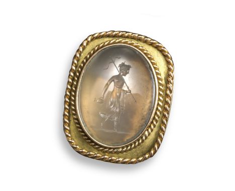 A 19th century carnelian intaglio depicting a partly dressed maiden, carrying a pitcher and staff, in a later gold ring mount