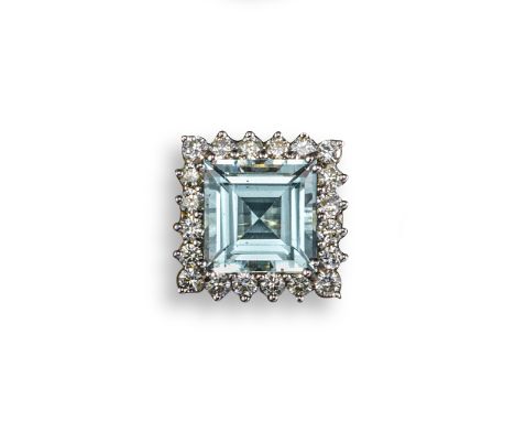 An aquamarine and diamond ring, the square-shaped aquamarine is set within a surround of circular-cut diamonds in yellow and 