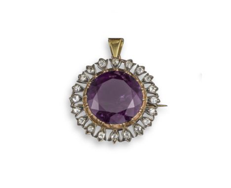 A Victorian amethyst and diamond pendant, the circular-cut amethyst is set within a surround of diamonds in fleur-de-lys sett