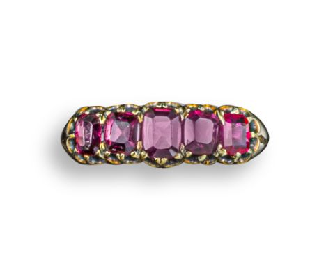 A ruby five-stone ring, set with graduated step-cut rubies in gold, size P 1/2