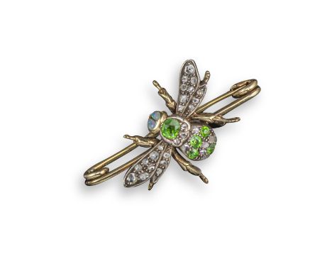 A Victorian gem-set bee brooch, the bee set with circular-cut demantoid garnets, rose-cut diamonds and with opal eyes in silv